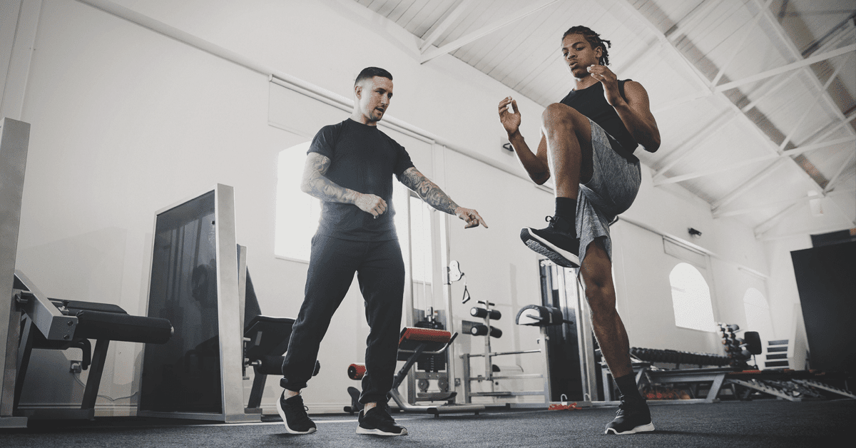 What's the Difference Between a Fitness Coach and a Personal Trainer?